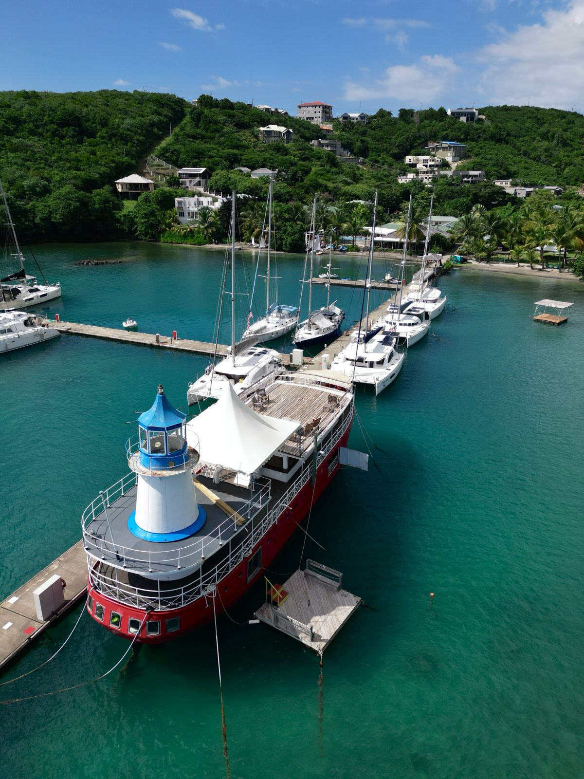 Aerial view of lighthouse boat and marina
